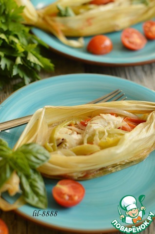 Chicken with vegetables in corn leaves