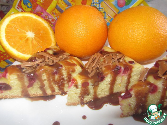 Orange sponge cake with berries in a slow cooker