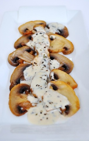 Warm carpaccio with mushroom cream sauce