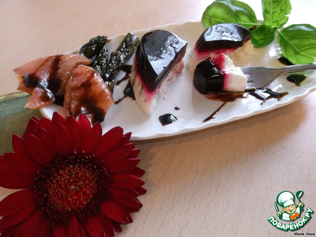 Mousse with salmon and asparagus in the mirror beet jelly