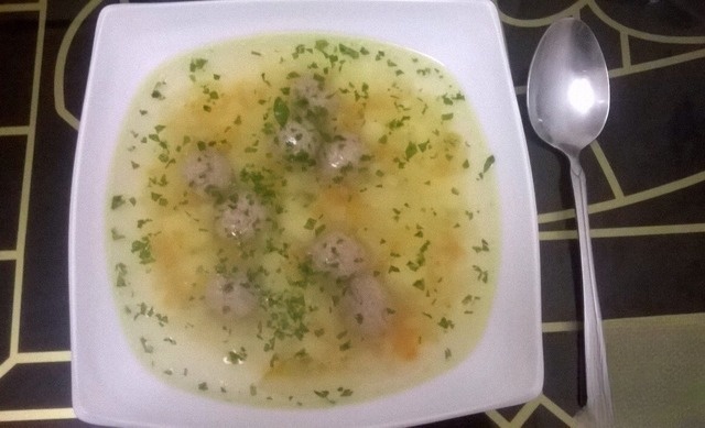Soup with meatballs and celery