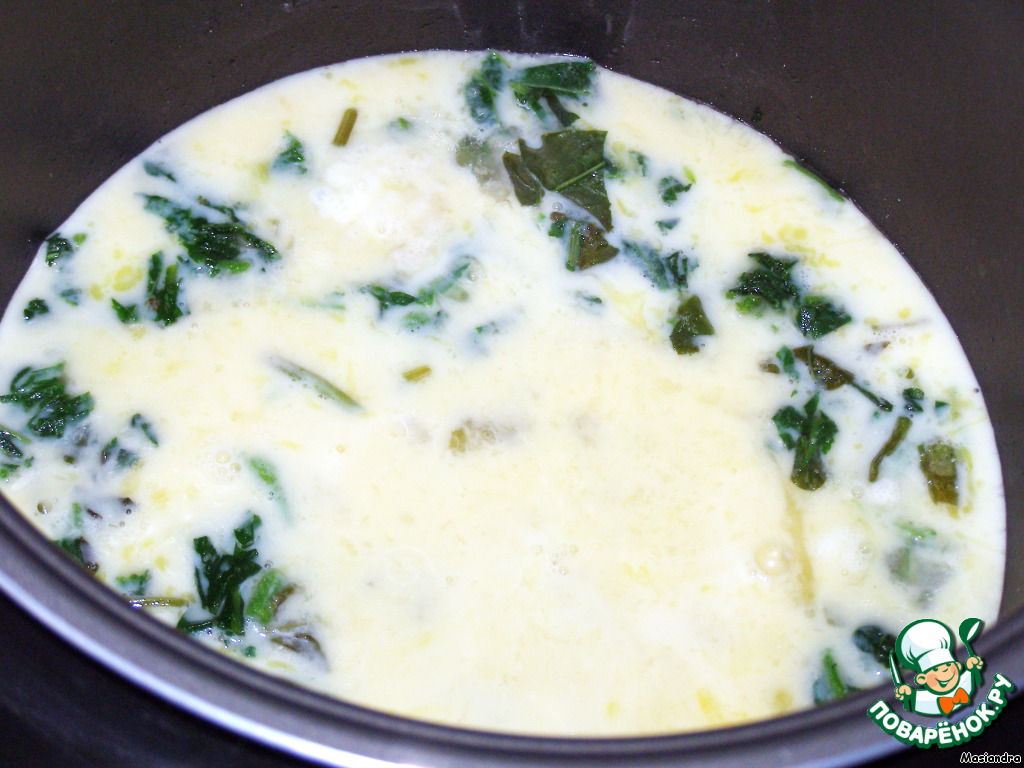 Scrambled eggs with young nettles in a slow cooker