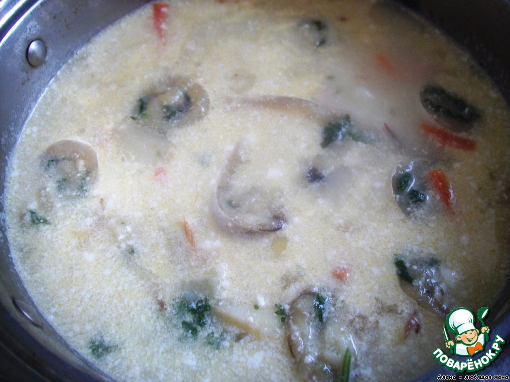 Creamy soup with fish spirals
