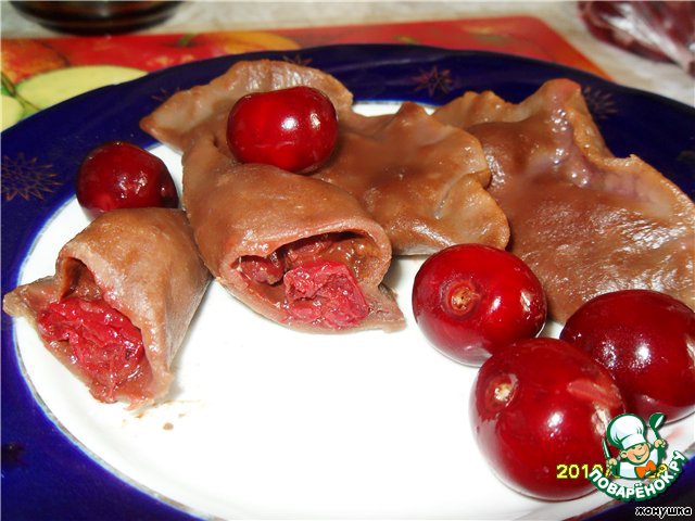 Chocolate dumplings with cherries