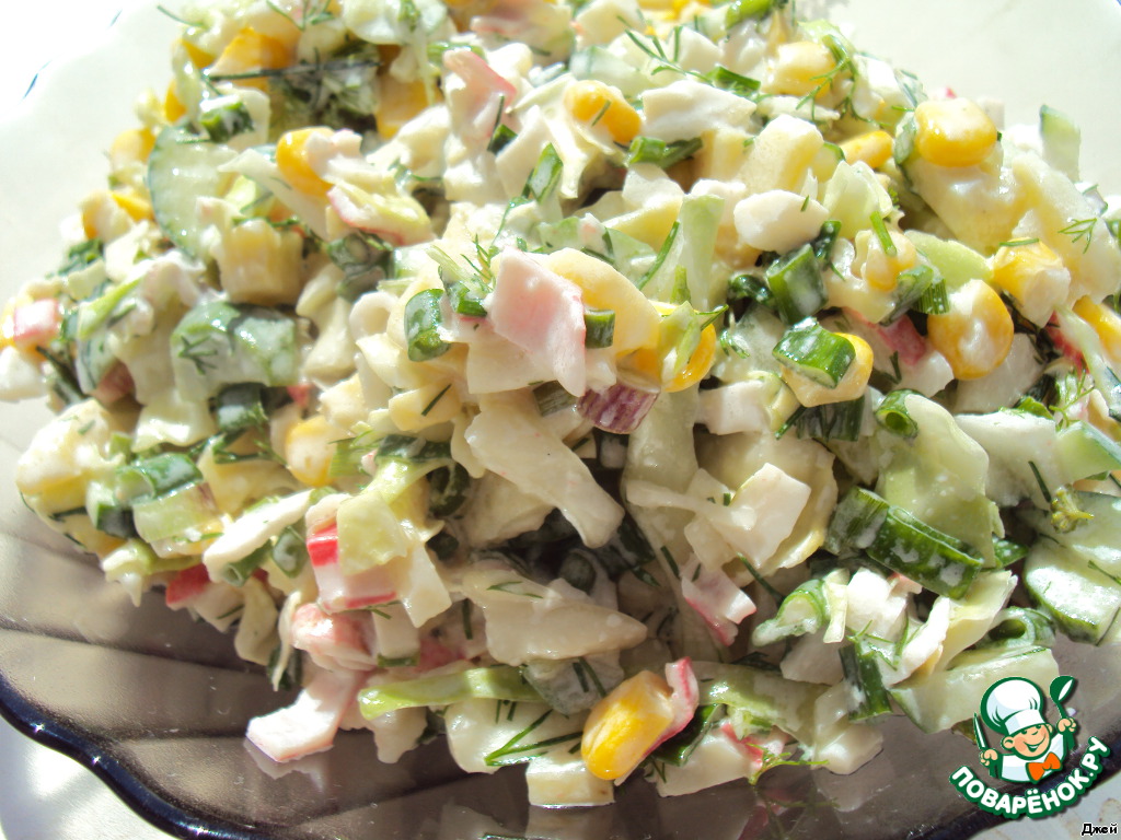 Salad with vegetables and crab sticks