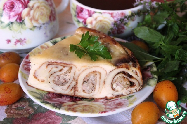 Pie from pancakes with cheese and pork in a slow cooker