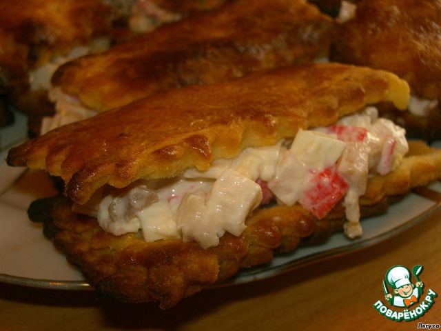 Puff with crab sticks and squid