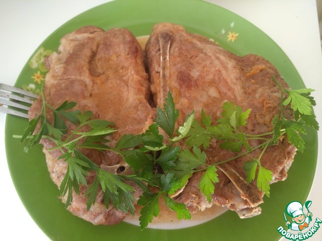 Pork neck in a slow cooker