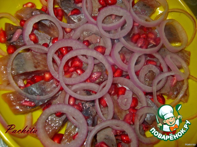 Salted herring with pomegranate