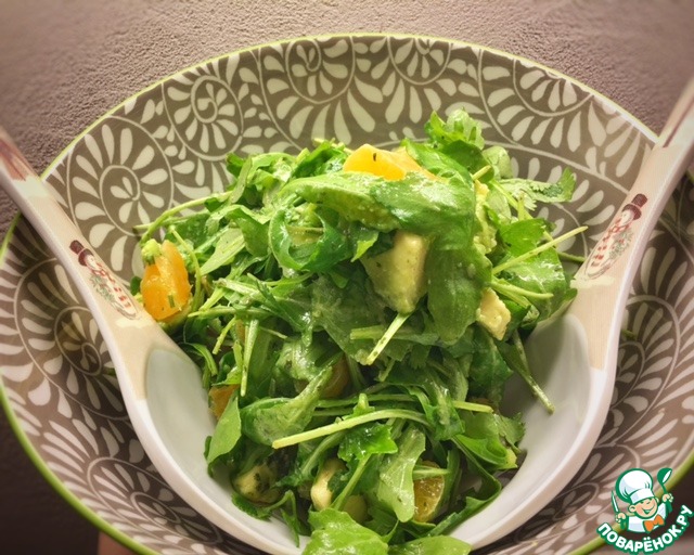 Fresh salad with tangerines and avocado