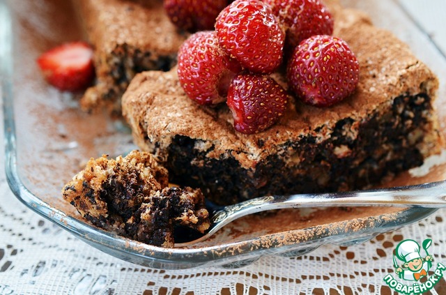 Chocolate tweed cake with nuts and strawberries