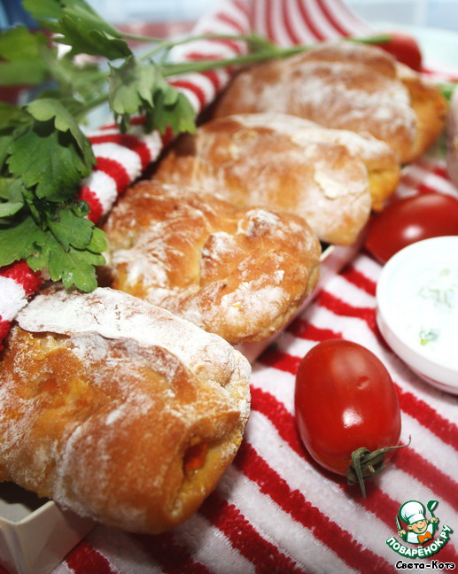 Pies with a fish and cream sauce