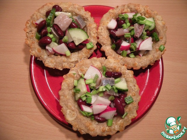 Tartlets with herring salad
