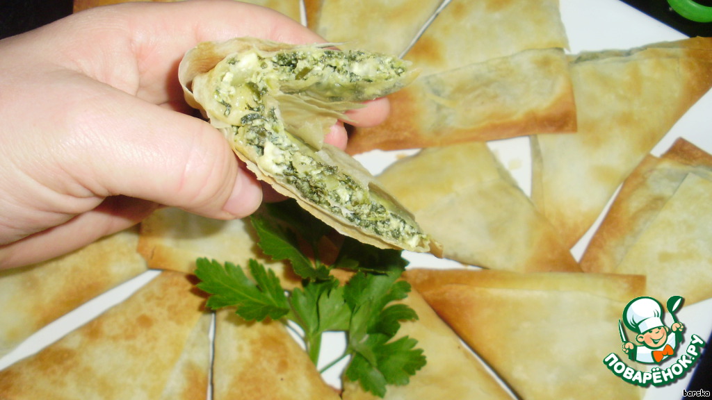 Triangles in Greek, with feta cheese and spinach