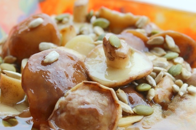 Butter mushrooms in garlic marinade with sesame seeds