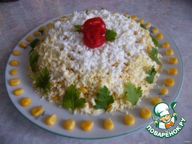 Salad with avocado, squid and corn