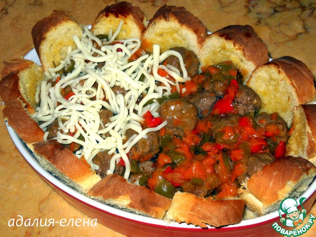 Casserole with bread and meatballs