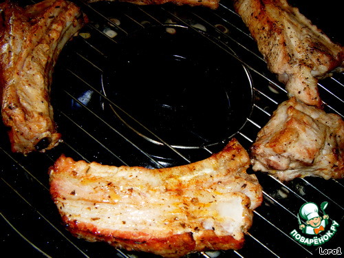 Ribs on the grill with spices 