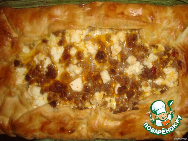 Meat pie stuffed with eggplant and feta