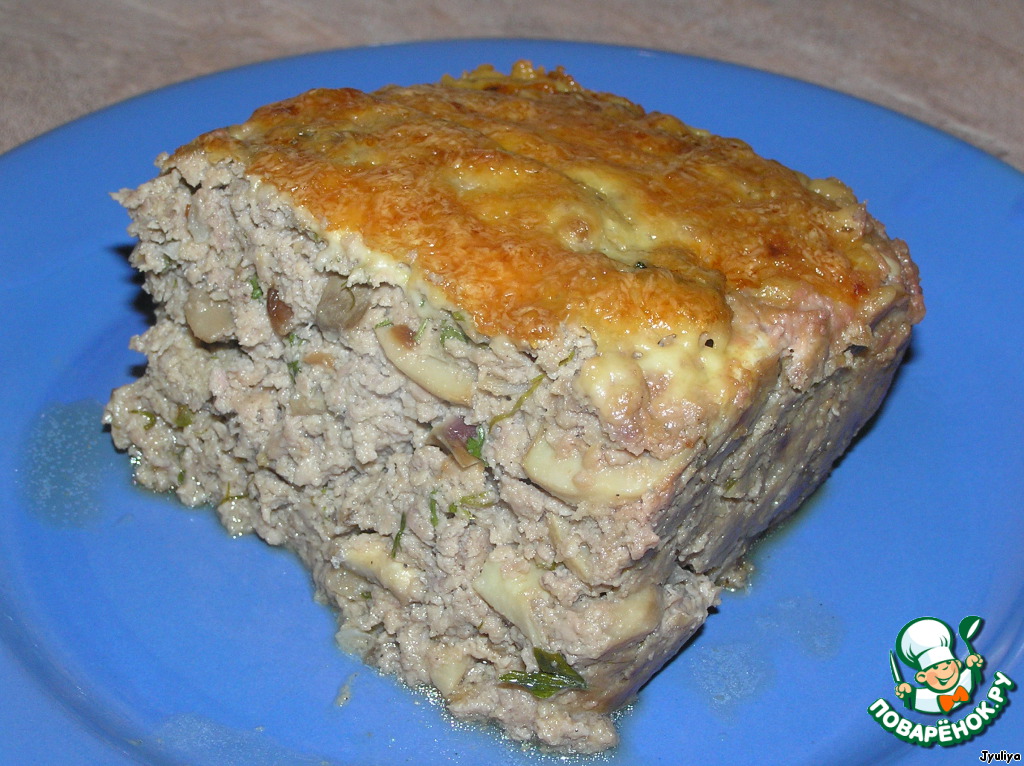 Casserole meat with mushrooms and greens