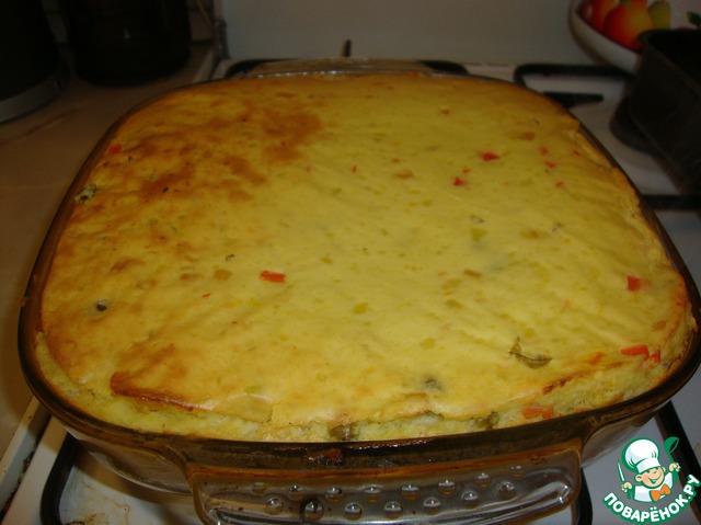 Zapekanka potato with melted cheese and vegetables