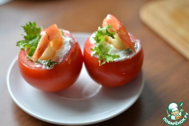 Appetizer of stuffed tomatoes and avocado