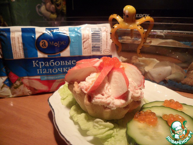 Crab salad in baskets with cream