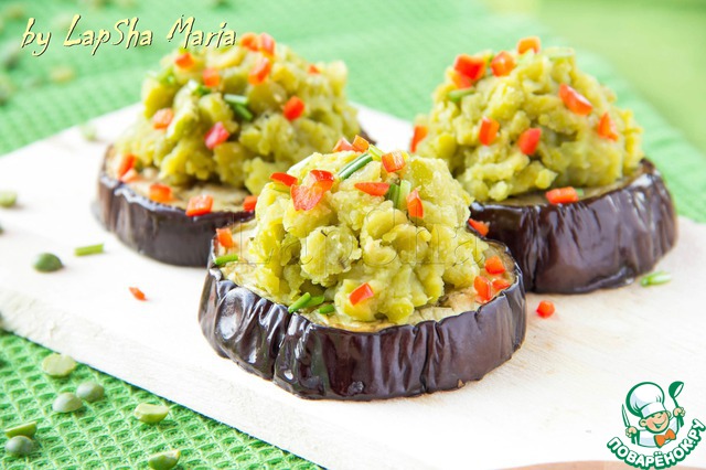 Hummus on a slice of baked eggplant