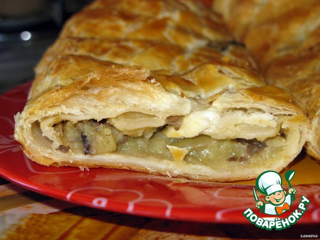 Puff pie with potatoes and mushrooms