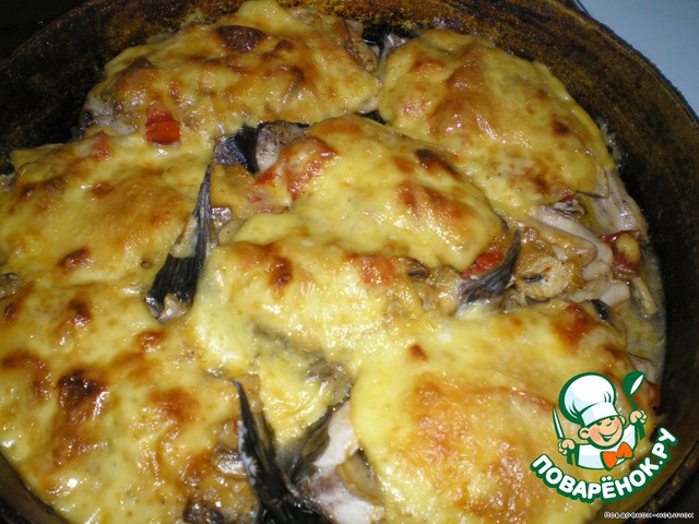 Carp baked with mushrooms