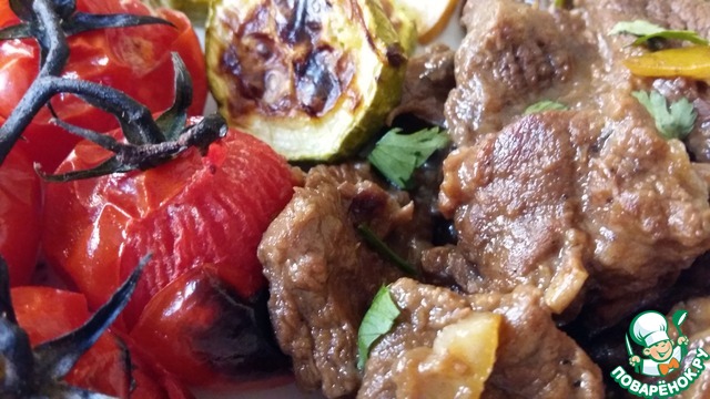 Beef with lemon and early vegetables