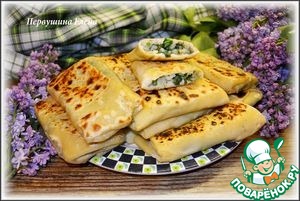 Pies made of thin dough with rice and herbs