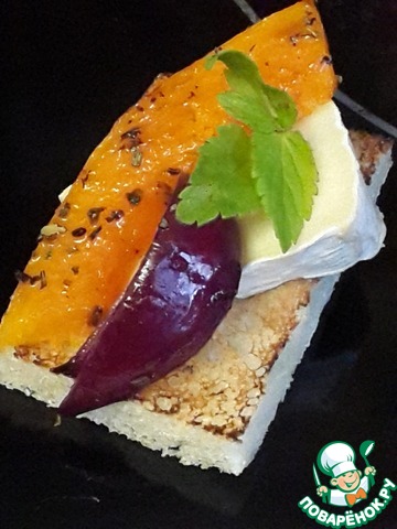 Canape with brie cheese and pumpkin