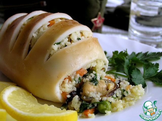 Squid stuffed with mussels, vegetables and cous-cous