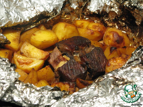 The meat in foil, baked in the oven