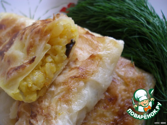 Cabbage rolls with mushrooms, vegetables and rice