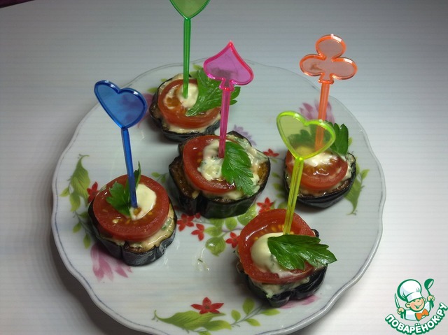 Appetizer medallions of eggplant and tomato
