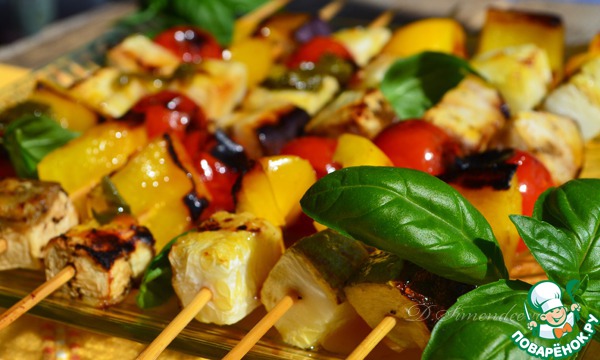 Summer skewers with orange sauce