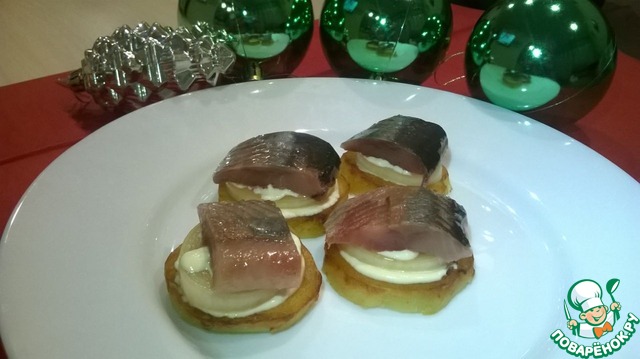 Snack under vodka with a herring