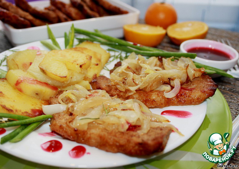 Chops of pork marinated in orange