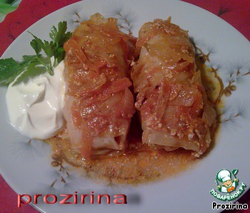 Stuffed cabbage in tomato-cream sauce