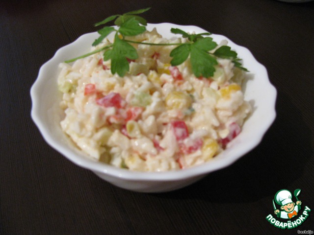 Vegetable salad with rice and crab sticks