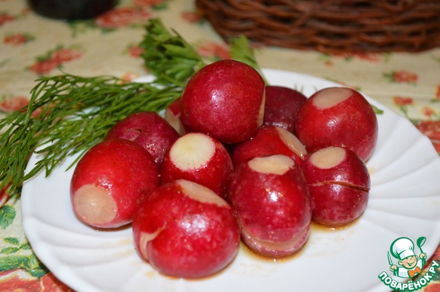 Appetizer of radish in the sauce with chili