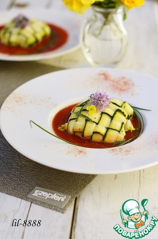 Fish in zucchini with tomato sauce