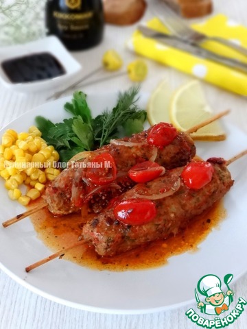 Kebab in the pan with fragrant sauce