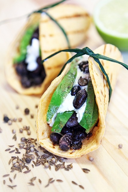 Tacos with beans, avocado and goat cheese