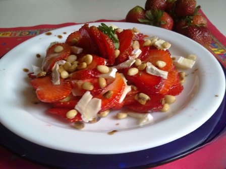 Strawberry carpaccio with cheese and nuts