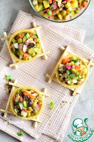 Vegetable salad with sprats