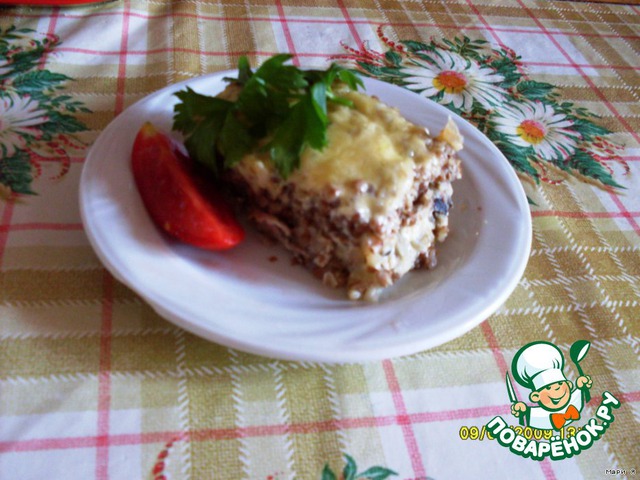 Casserole of buckwheat porridge with chicken and mushrooms