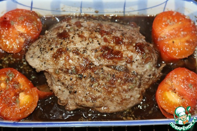 Veal baked with sauce